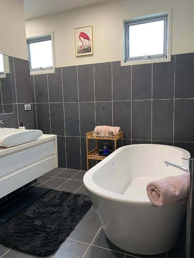 Holiday home The Palm - Beachside Home With Heated Pool, Cinema & Games Room Mudjimba Australia