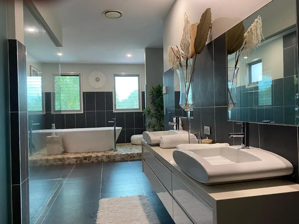 Holiday home The Palm - Beachside Home With Heated Pool, Cinema & Games Room Mudjimba